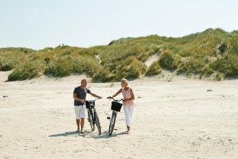 Fahrradfahren am Strand von Fanö
