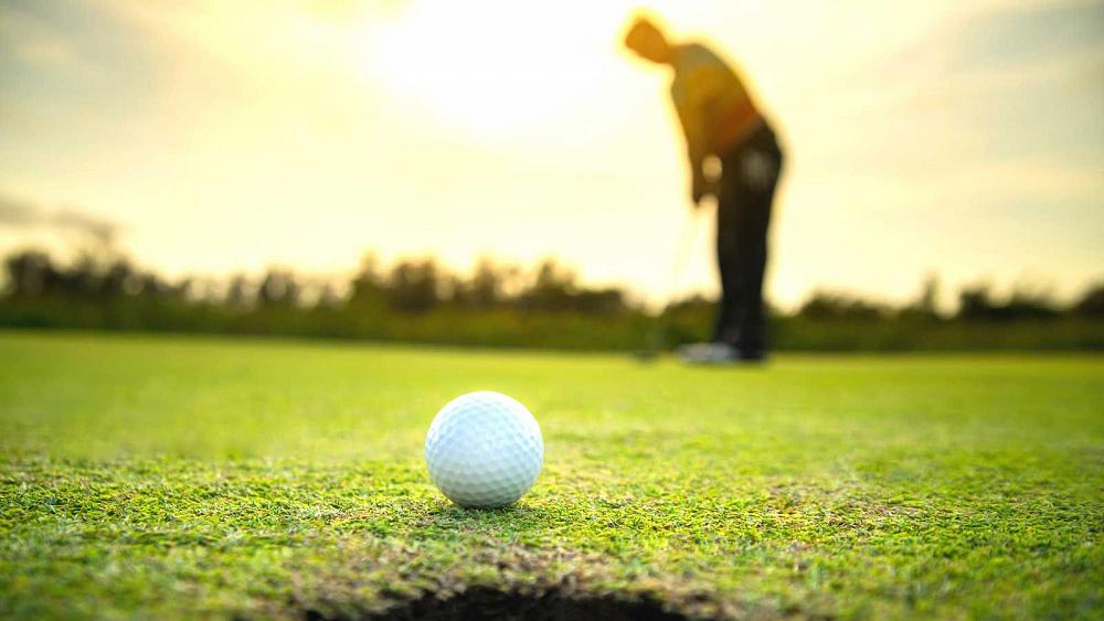 Golfen auf Fanö im Sonnenuntergang